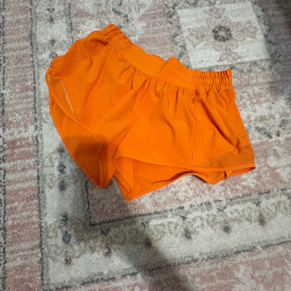lululemon orange hotty hot 2.5” shorts